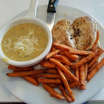 The Grotto - Entree chicken breast with 2 sides. Sweet Potato fries that are good and broccoli cheddar soup. Wish the chicken was not so seasoned. - American Near Me - Springfield, Missouri The Grotto - Entree chicken breast with 2 sides. Sweet Potato fries that are good and broccoli cheddar soup. Wish the chicken was not so seasoned. - American Near Me - Springfield, Missouri