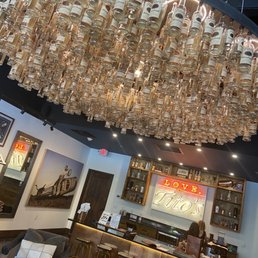 Soo dope! Tito's bottle chandelier!