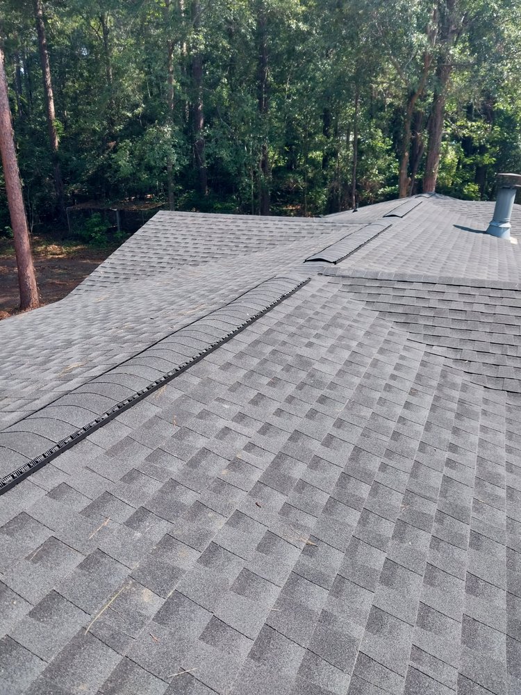 Slide of Tyndal Roofing