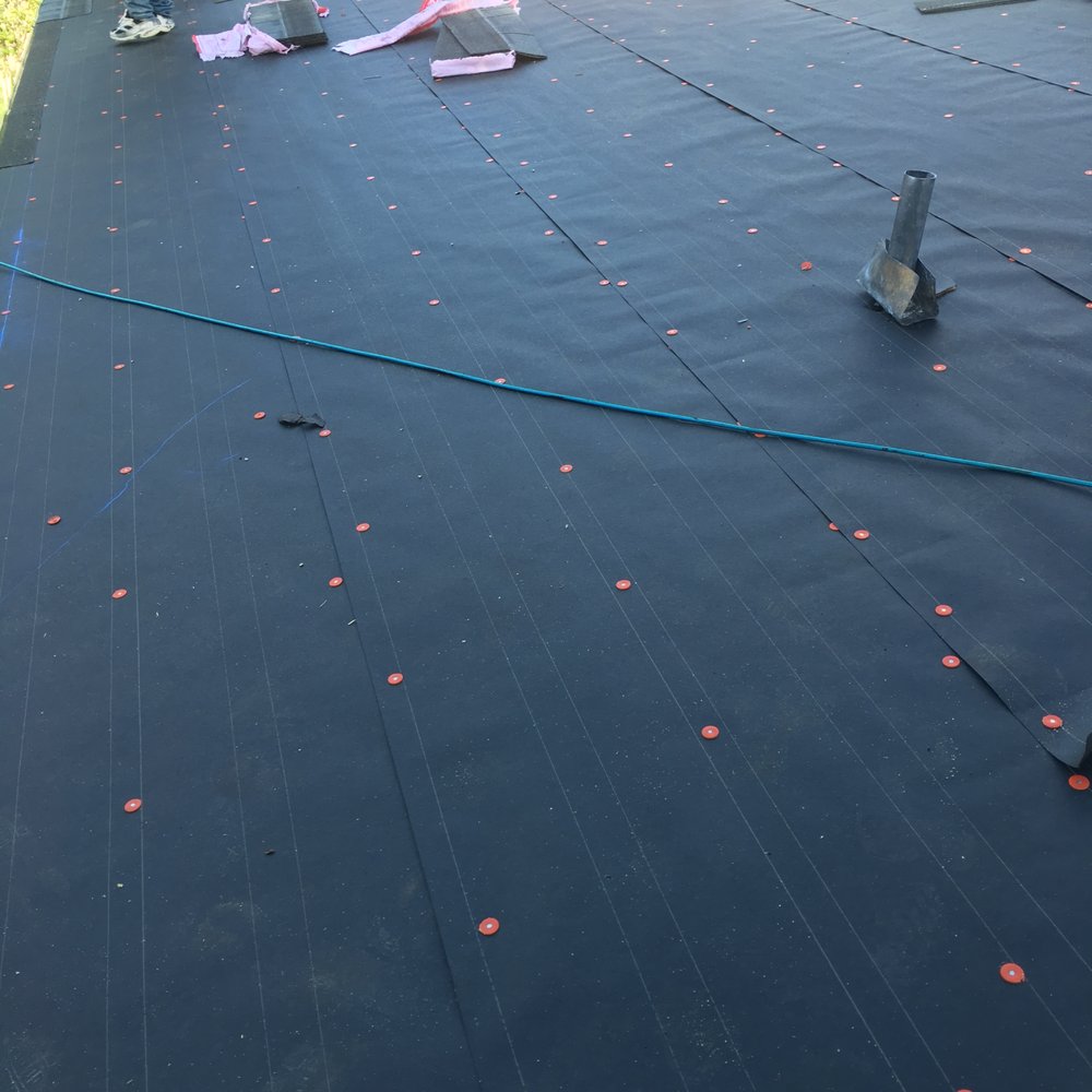 Slide of Mercedes Roofing