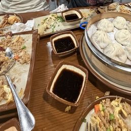 Fried rice, pork soup dumplings and one pop stickers left.