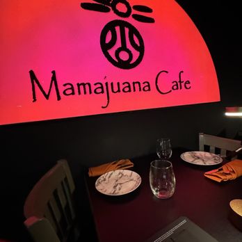 Mamajuana Cafe - Interior Sign/Table - Latin American Near Me - Houston, Texas Mamajuana Cafe - Interior Sign/Table - Latin American Near Me - Houston, Texas