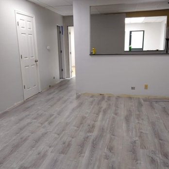 HC  construction - mpty room with wood floors - General Contractors Near Me - Conifer, Colorado