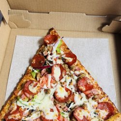 Aladdin Sizzler - Slice Supreme Pizza is so good and very delicious