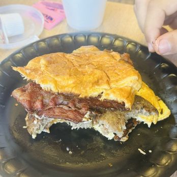 The Harmony Cafe - a half eaten sandwich on a black plate - Waffles Near Me - Saint Stephen, South Carolina The Harmony Cafe - a half eaten sandwich on a black plate - Waffles Near Me - Saint Stephen, South Carolina