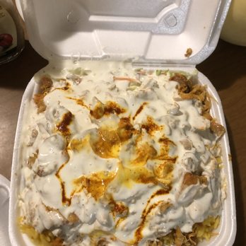 Yassa Grill - Chicken over rice with extra white sauce please - Food Trucks Near Me - Lowell, Massachusetts Yassa Grill - Chicken over rice with extra white sauce please - Food Trucks Near Me - Lowell, Massachusetts
