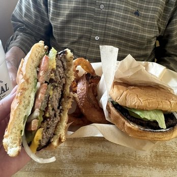 Novice General Store - Check the cross section and beauty of the bacon cheeseburger and hamburger with golden delicious onion rings in the background. - Convenience Stores Near Me - Paris, Texas Novice General Store - Check the cross section and beauty of the bacon cheeseburger and hamburger with golden delicious onion rings in the background. - Convenience Stores Near Me - Paris, Texas