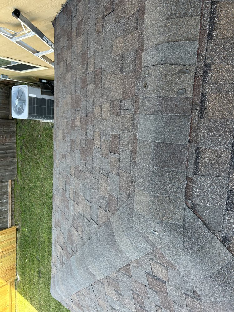 Slide of Mancia's Roofing Services