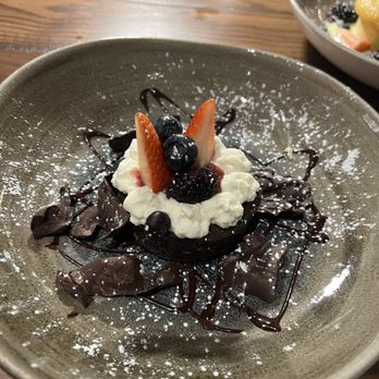 Tuscan Kitchen Salem - Dark chocolate flourless espresso cake. - Italian Near Me - Salem, New Hampshire Tuscan Kitchen Salem - Dark chocolate flourless espresso cake. - Italian Near Me - Salem, New Hampshire