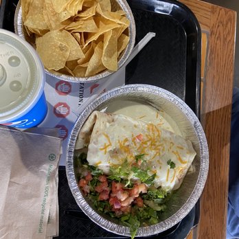 Cafe Mexicali - Smothered burrito and a side of chips - Mexican Near Me - Boulder, Colorado