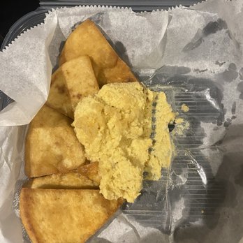 Craft Brew - Garlic with Hummus and Fried Pita chips (half eaten) - Burgers Near Me - Goshen, New York