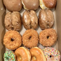 Jack's Donuts Wheel - Maple and glaze with whipped cream, maple buttermilk, crumb, cake sprinkle, glaze, and sprinkle