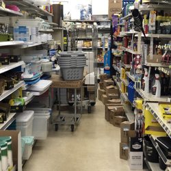 Dollar General - Aisle blocked by random boxes and carts.