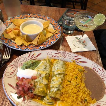 Guapo's Cocina & Bar - Chicken enchiladas, quest blanco and mango margaritas- an amazing combination! - Mexican Near Me - Gaithersburg, Maryland Guapo's Cocina & Bar - Chicken enchiladas, quest blanco and mango margaritas- an amazing combination! - Mexican Near Me - Gaithersburg, Maryland