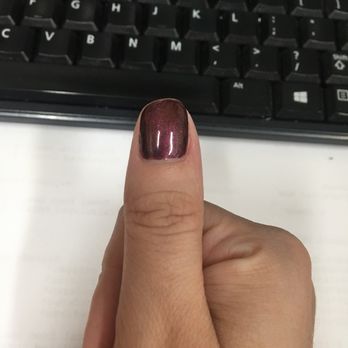 Silver Nails - Look how crooked this nail is! It's driving me crazy. I asked her to fix it and she said she did... - Nail Salons Near Me - Odenton, Maryland