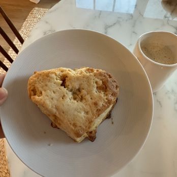 Eat Real Cafe - Butterscotch heart-shaped scone I took to go bc I was so full. I warmed it up the next day and it was so delicious and fresh. - New American Near Me - Valencia, California Eat Real Cafe - Butterscotch heart-shaped scone I took to go bc I was so full. I warmed it up the next day and it was so delicious and fresh. - New American Near Me - Valencia, California