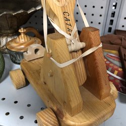 Shop class giveaway, I presume. Neat little catapult.