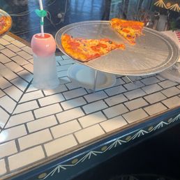 Slices or whole pies available. Slices or whole pies available.