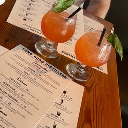 Sipping into my Friday evening!  Strawberry Fields Forever Vodka, Aquavit, strawberry, basil, lemon, and basil leaf.
