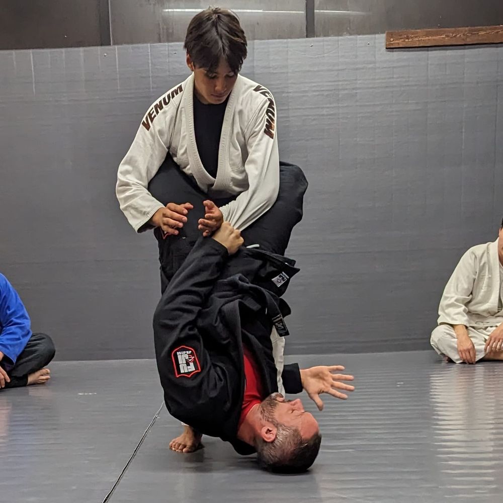 The Training Mat Logo