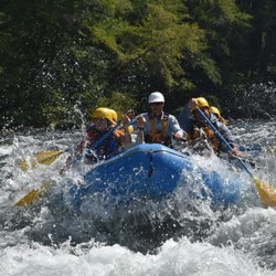 North Umpqua Outfitters - That's me in a red T-shirt paddling in a front of the raft boat and having one of the best days of my life! Thank you so much for this trip!