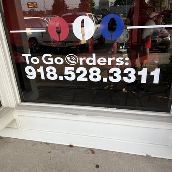 Thai Village - to go orders sign in window - Thai Near Me - Tulsa, Oklahoma