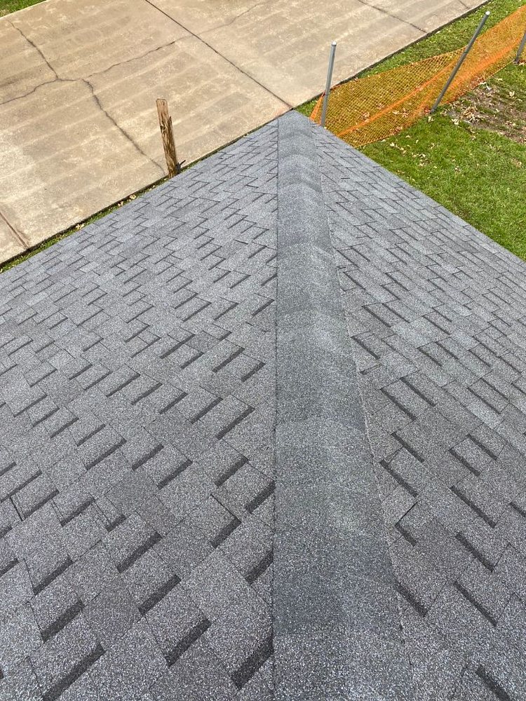 Slide of Pelican Roofing Company