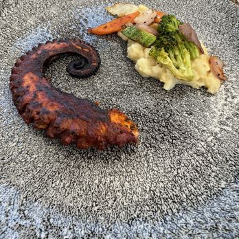 Olio - Grilled Octopus with Adobo - Mediterranean Near Me - Cancún, ROO Olio - Grilled Octopus with Adobo - Mediterranean Near Me - Cancún, ROO