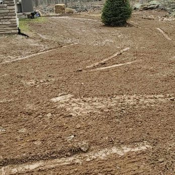Willow Mountain Construction - a lot of dirt in the yard - Lawn Services Near Me