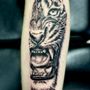 Photo of Aftershock Tattoo