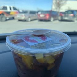 Divine Health  Smoothies - Mango berry açaí bowl. I hope someday they can top it with fresh unfrozen fruit