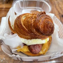 Teal House - Croissant breakfast sandwich with sausage
