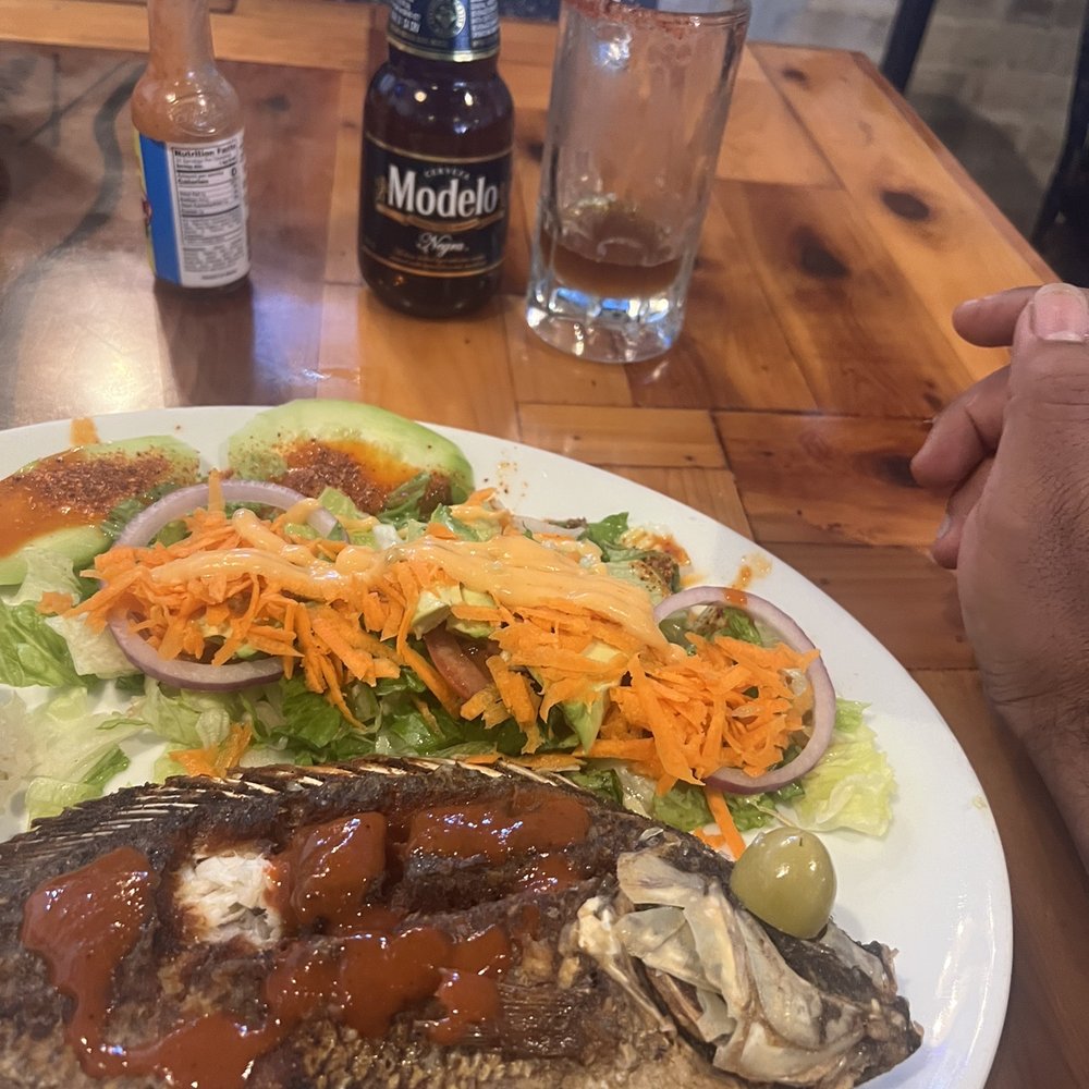 La Laguna Mariscos and Sushi - Mojarra frita and a cold mug with modelo - Bars Near Me - Laredo, Texas La Laguna Mariscos and Sushi - Mojarra frita and a cold mug with modelo - Bars Near Me - Laredo, Texas