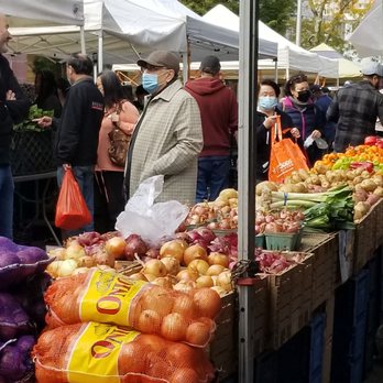 Forest Hills Greenmarket - Shoppers buying vegtables - Farmers Market Near Me - Forest Hills, New York