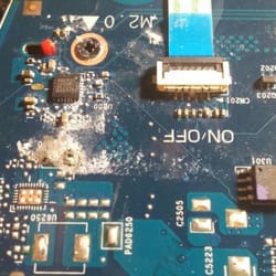 ComputerWiz Tech - Here is a damaged motherboard of a laptop.