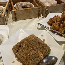 Tripe, har how, sticky rice, stir fry turnip cake, hand rolled rice rolls, persevere egg congee