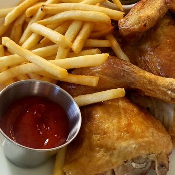 Hive Bakery & Cafe - Half chicken with chimichuri sauce on the side and crispy fries - Bakeries Near Me - West Palm Beach, Florida