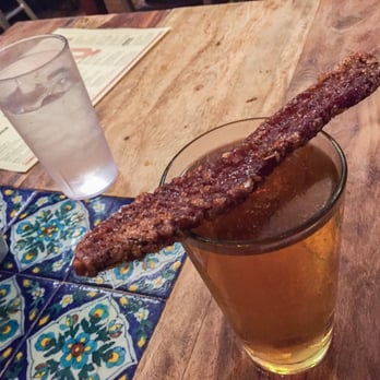 Honky Tonk BBQ - Bacon and Brew ($6) featured a chewy, thick-sliced bacon strip, candied with brown sugar and left teetering atop a frosty Old Style beer. - Barbeque Near Me - Chicago, Illinois Honky Tonk BBQ - Bacon and Brew ($6) featured a chewy, thick-sliced bacon strip, candied with brown sugar and left teetering atop a frosty Old Style beer. - Barbeque Near Me - Chicago, Illinois