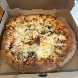 Sausage and mushroom pizza with extra thick crust Sausage and mushroom pizza with extra thick crust