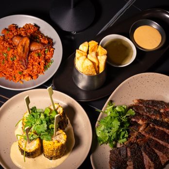 Spice - Accra bowl, Cassava fries, roasted corn, sliced ribeye - Tapas/Small Plates Near Me - Charlotte, North Carolina Spice - Accra bowl, Cassava fries, roasted corn, sliced ribeye - Tapas/Small Plates Near Me - Charlotte, North Carolina