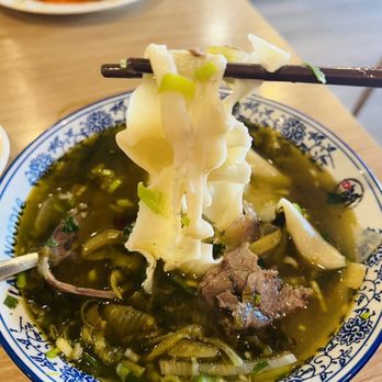 LAN Noodle - Signature Beef noodles with side of pickled mustard green - Noodles Near Me - West Covina, California LAN Noodle - Signature Beef noodles with side of pickled mustard green - Noodles Near Me - West Covina, California