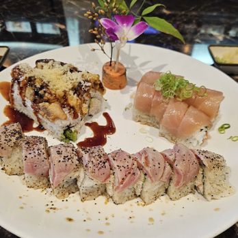 SkyBay Sushi - In front is the Newport Roll, and on the back left is the Kamikaze Roll, and on the right is the Salmon Lover Roll - Sushi Bars Near Me - Costa Mesa, California SkyBay Sushi - In front is the Newport Roll, and on the back left is the Kamikaze Roll, and on the right is the Salmon Lover Roll - Sushi Bars Near Me - Costa Mesa, California