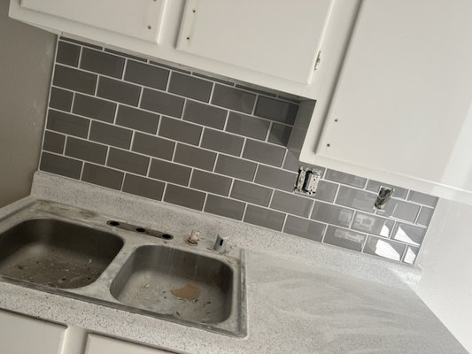Backsplash tile installation - This backsplash tile was added to a renovation project to enhance the look of the kitchen. Backsplash tile installation - This backsplash tile was added to a renovation project to enhance the look of the kitchen.