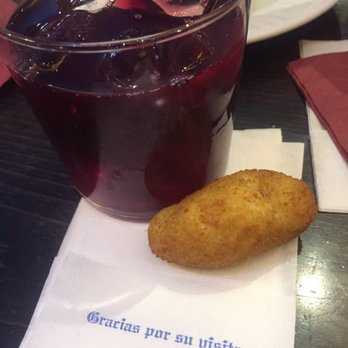 La Descubierta - Sangria and a croqueta.   Love the napkin! - Spanish Near Me - Madrid, M