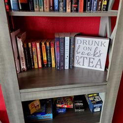 De-Ja Brew - Adult book shelf area.