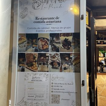 Sidreria La Poasada - Menu on outside wall of the restaurant - Spanish Near Me Sidreria La Poasada - Menu on outside wall of the restaurant - Spanish Near Me