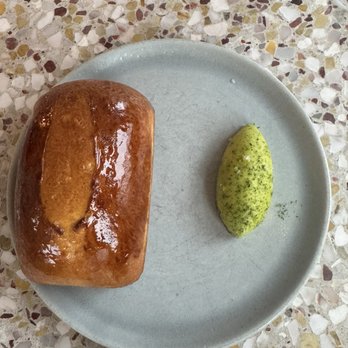 Jeune Et Jolie - The bread is crispy on the outside but has a soft milky inside. And the herb butter I couldn't get enough of. - French Near Me - Carlsbad, California Jeune Et Jolie - The bread is crispy on the outside but has a soft milky inside. And the herb butter I couldn't get enough of. - French Near Me - Carlsbad, California
