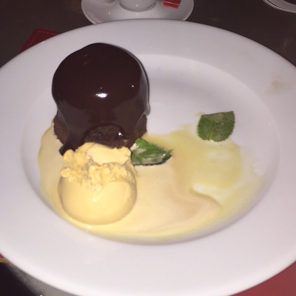 This is the TORTINO AL CIOCCOLATO dessert with caramel ice cream. It was Amazing. This is the TORTINO AL CIOCCOLATO dessert with caramel ice cream. It was Amazing.