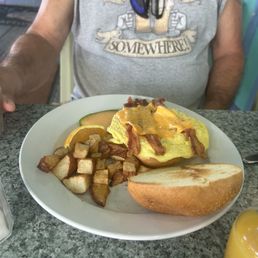 Bacon egg and cheese with home fries and fruit