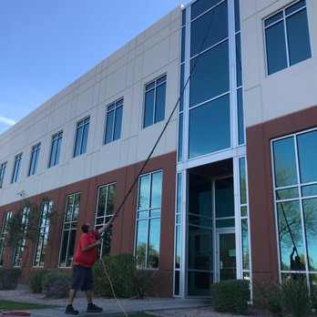 ClearPro Window & Carpet Cleaning - Cleaning windows on a commercial building in Scottsdale. - Window Washing Near Me - Phoenix, Arizona